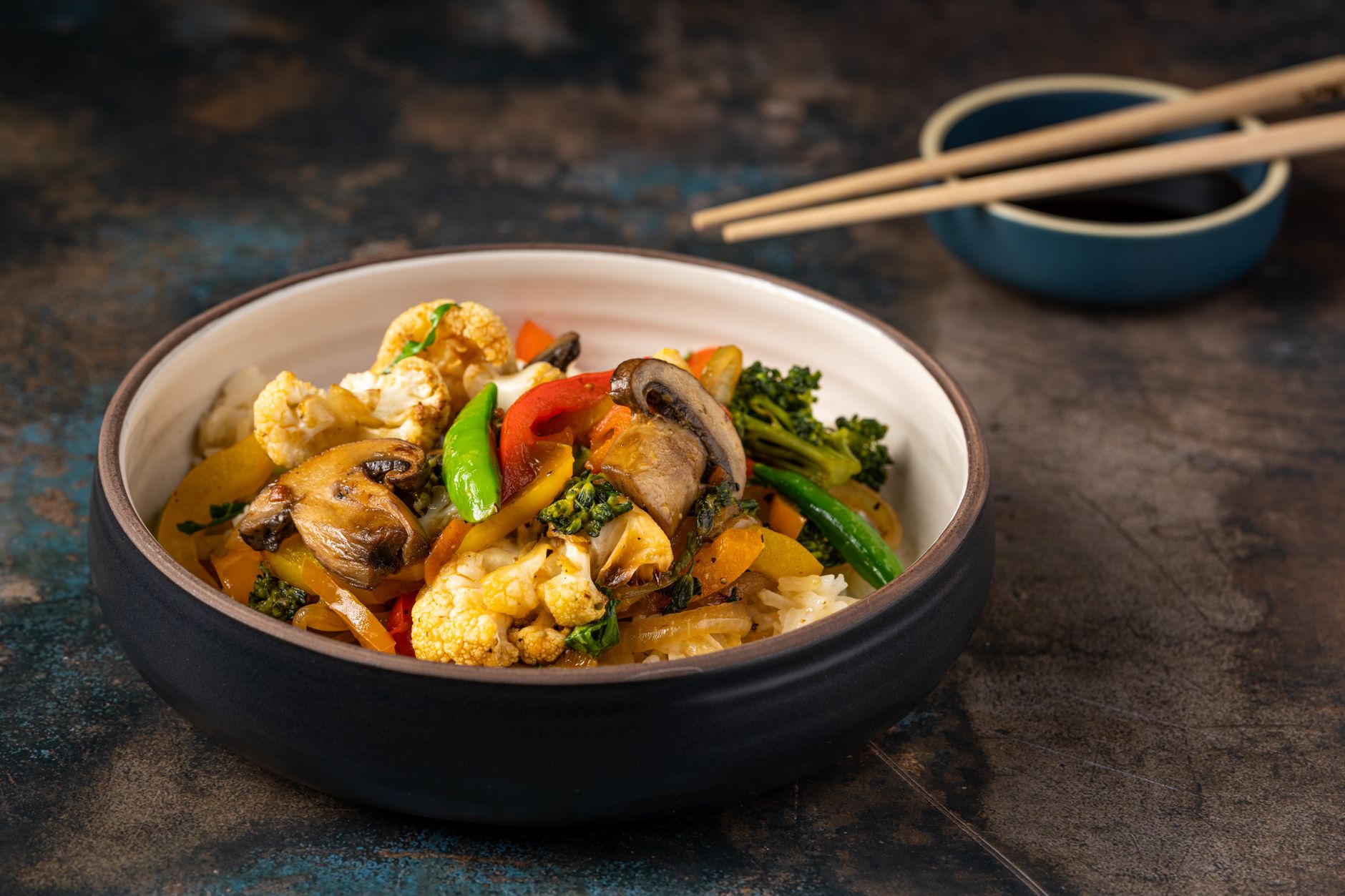 high protein vegan lunch bowl with tempeh brown rice and roasted vegetables