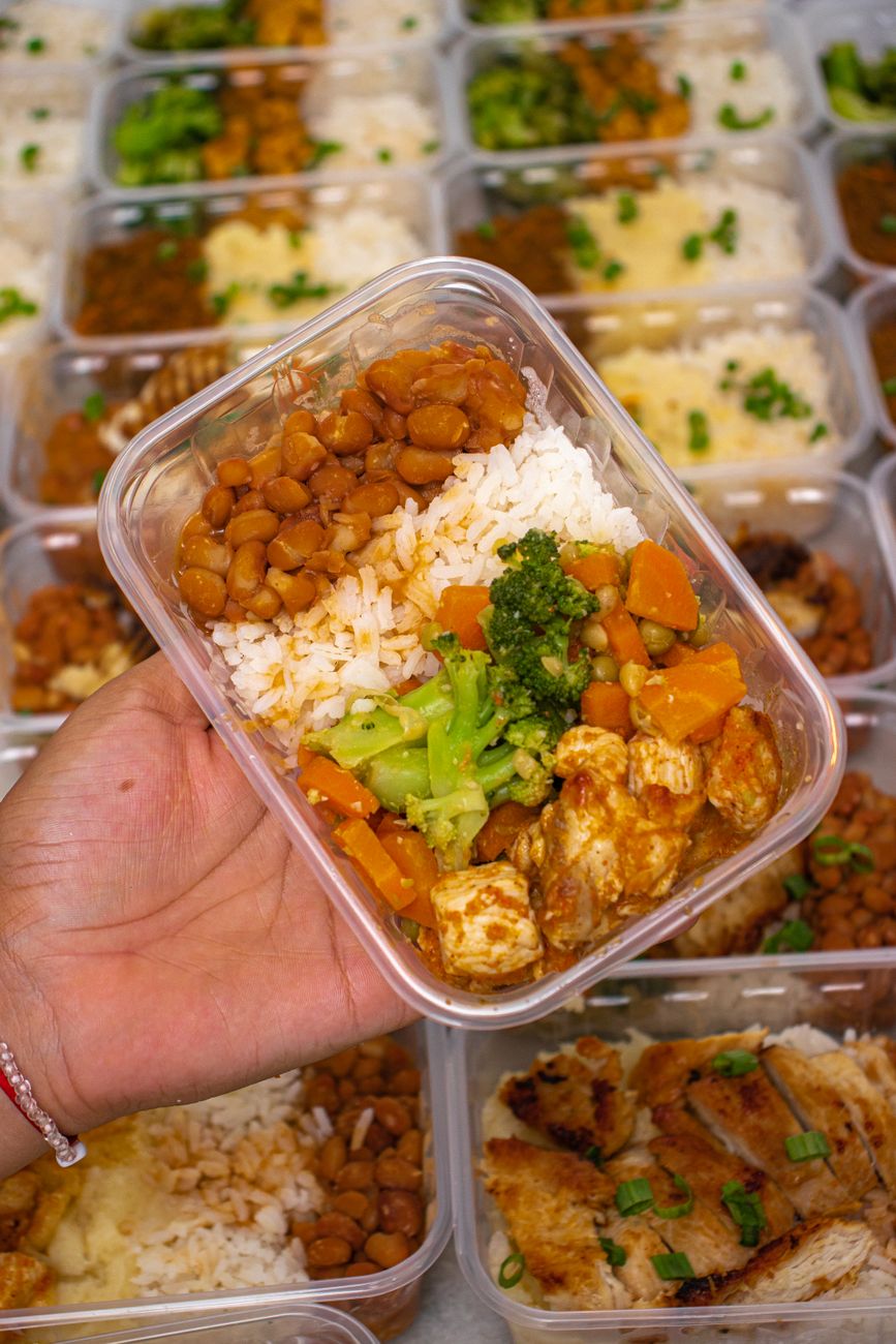 portioned budget dinners packed in containers for the week