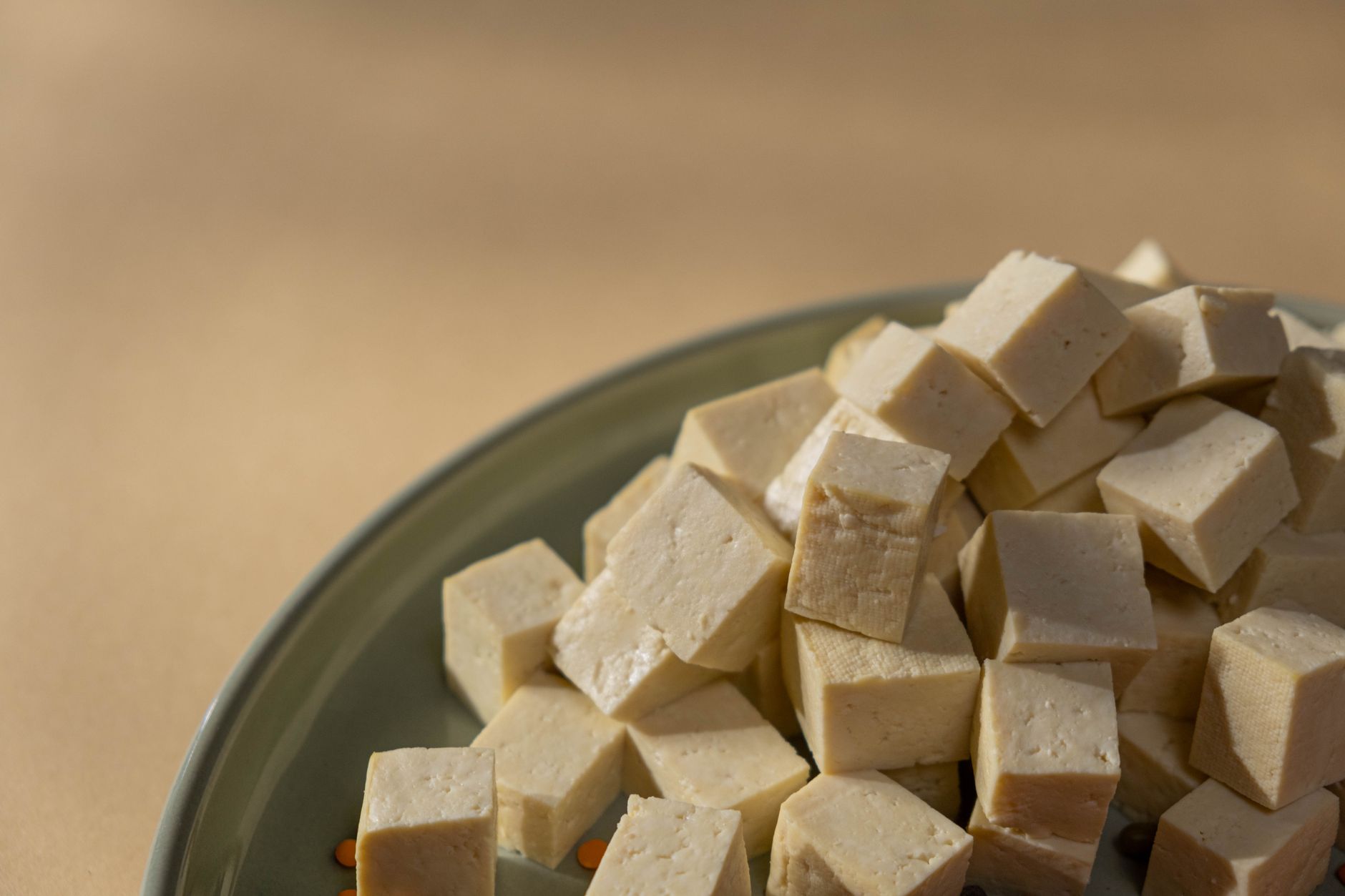 pressing and cubing extra firm tofu for high protein vegan meal prep