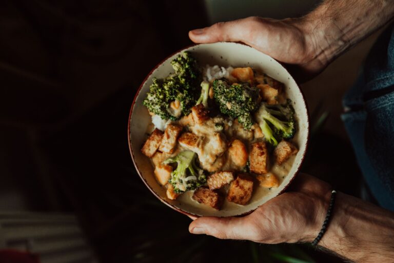 vegan meal prep lunch bowls with crispy tofu rice and edamame in glass containers